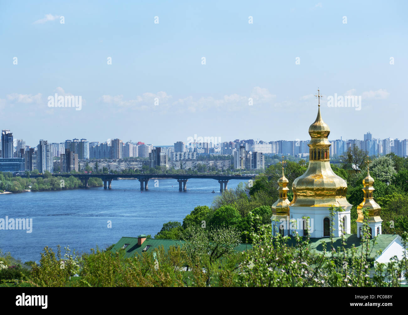 Beautiful spring landscape of Paton bridge across the Dnieper river with the Church. Kiev, Ukraine Stock Photo