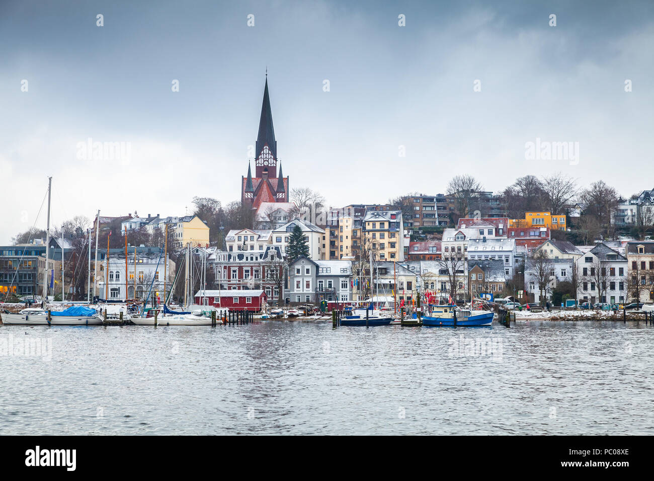 Flensburg town in winter, Germany. Coastal skyline under dark cloudy sky  Stock Photo - Alamy