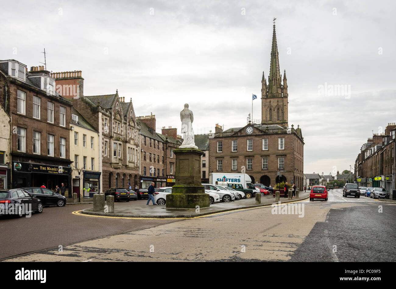 A view of the High Street in Montrose, Scotland looking towards Old and St Andrews Church and the monument to Joseph Hume. Stock Photo