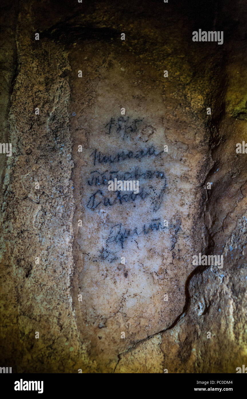 Croatia: signatures of speleologists dating back to the 1800s found on the rock formations in the Caves of Barać, near the village of Nova Kršlja Stock Photo