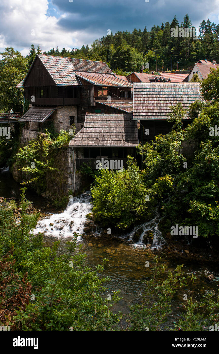 Croatia, Europe: Rastoke, the historic center of the municipality of Slunj, with its wooden houses, water mills and waterfalls into the Korana river Stock Photo