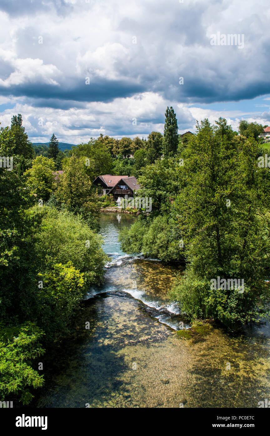 Croatia, Europe: Rastoke, the historic center of the municipality of Slunj, with its wooden houses, water mills and waterfalls into the Korana river Stock Photo