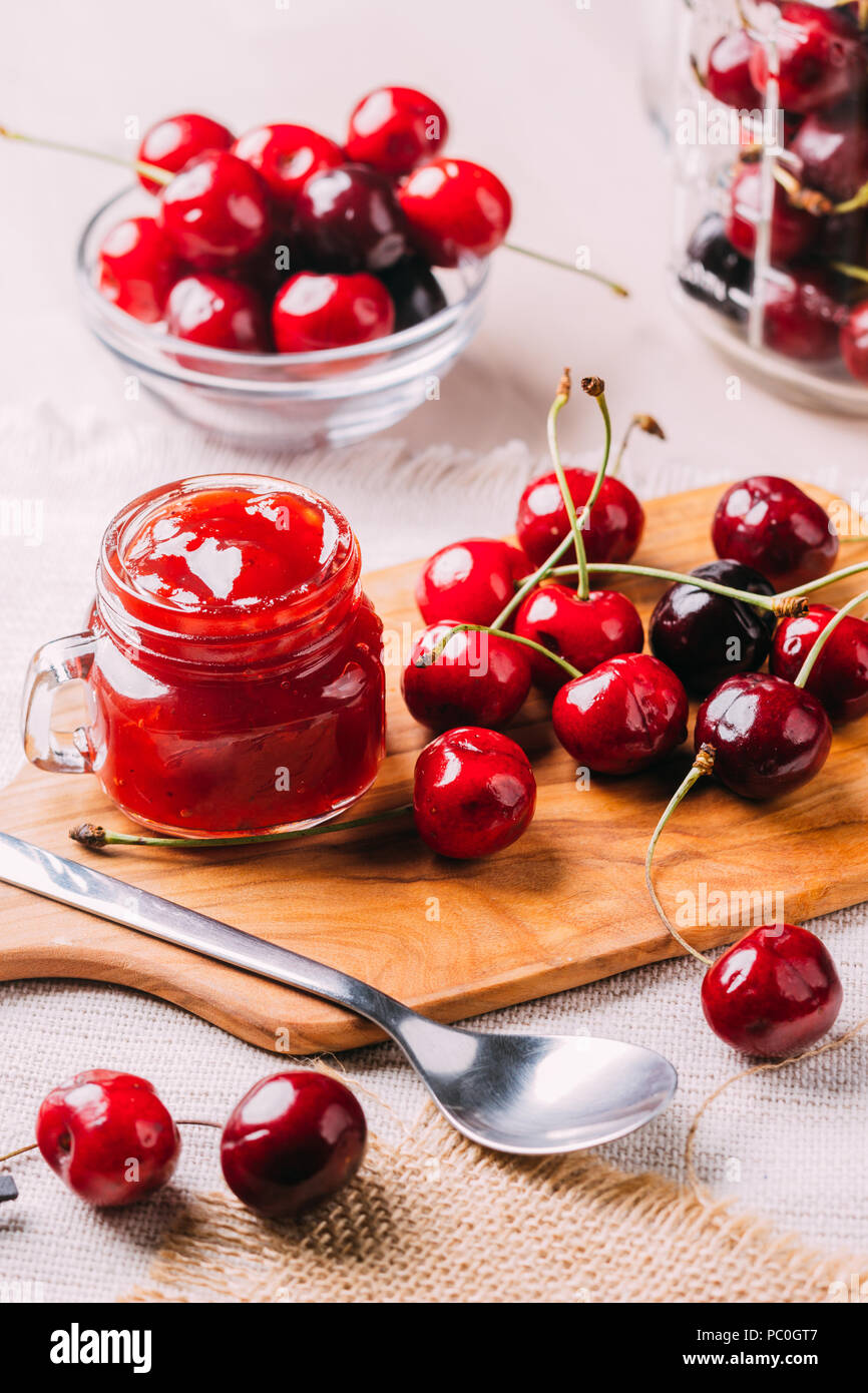 Homemade preparation of cherry jam, sweet food Stock Photo