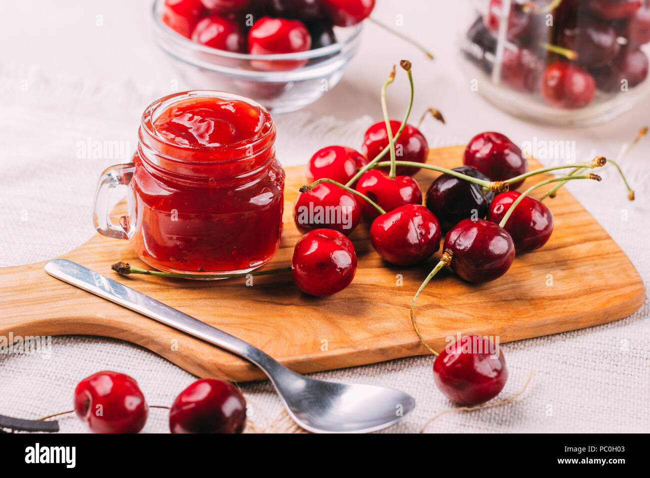 Homemade preparation of cherry jam, sweet food Stock Photo