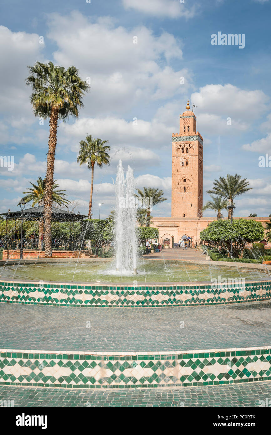 Koutoubia or Kutubiyya Mosque, Jemaa el-Fnaa, fountains and palm trees on a square, Marrakech Medina, Marrakech, Morocco, Africa Stock Photo