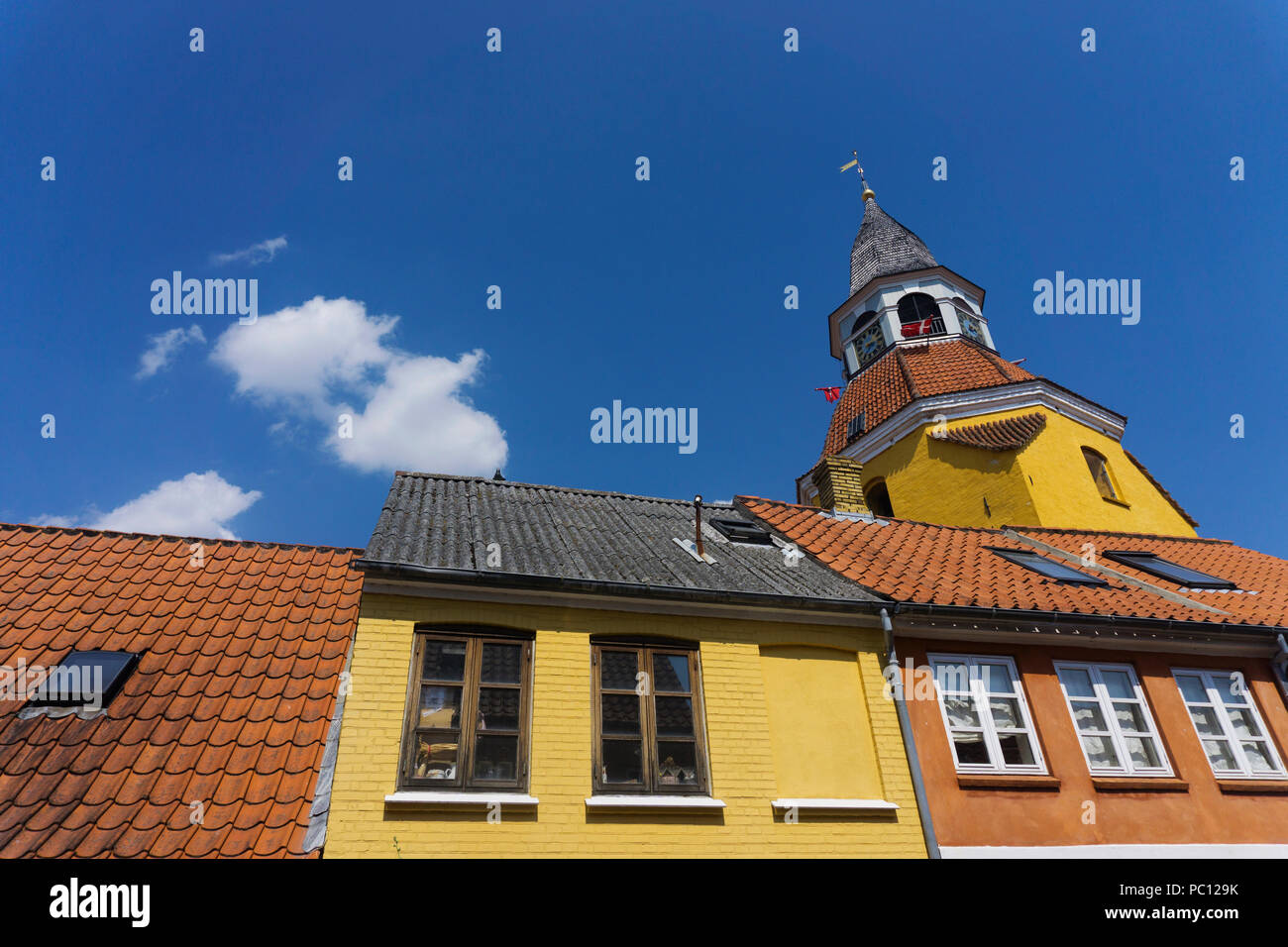 Historic tower and buildings in the town of Faaborg in Denmark Stock Photo