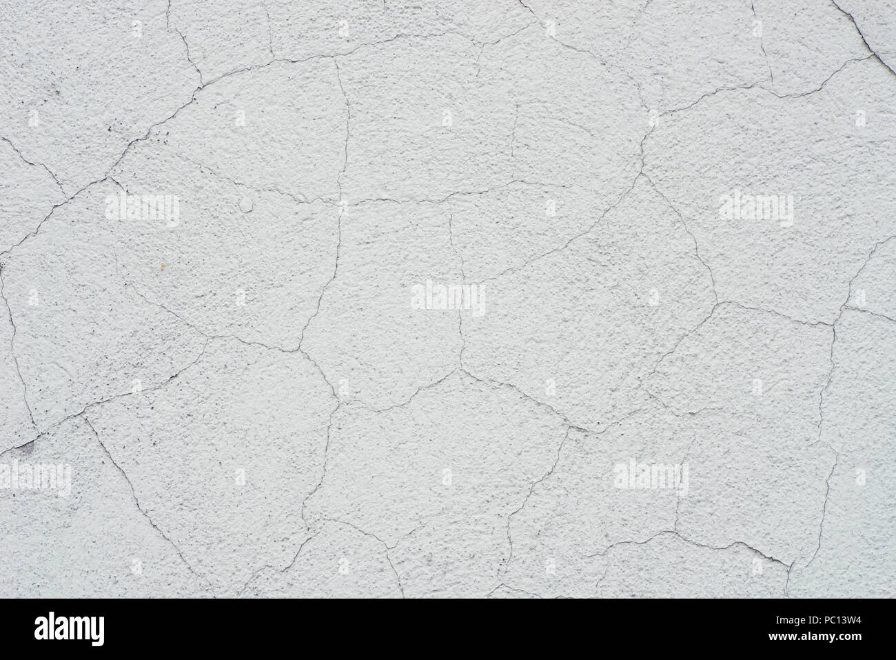 white painted cracked wall texture background Stock Photo