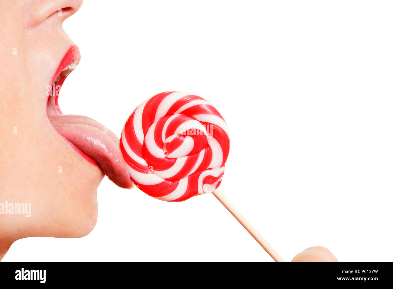 Woman Licking a Lollipop, Close Up Stock Photo