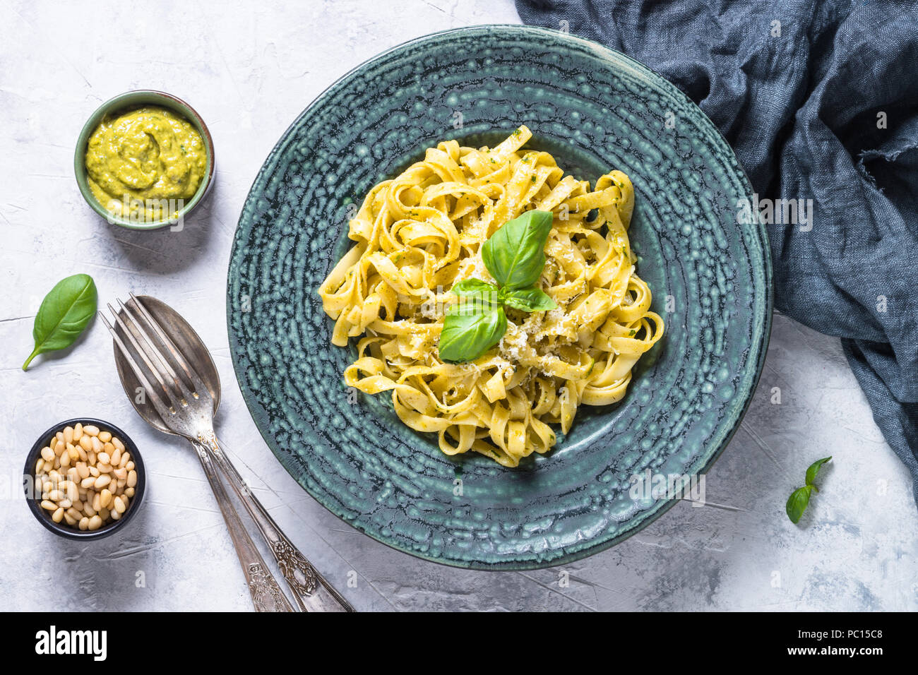 Tagliatelle pasta with pesto sauce and parmesan Stock Photo Alamy