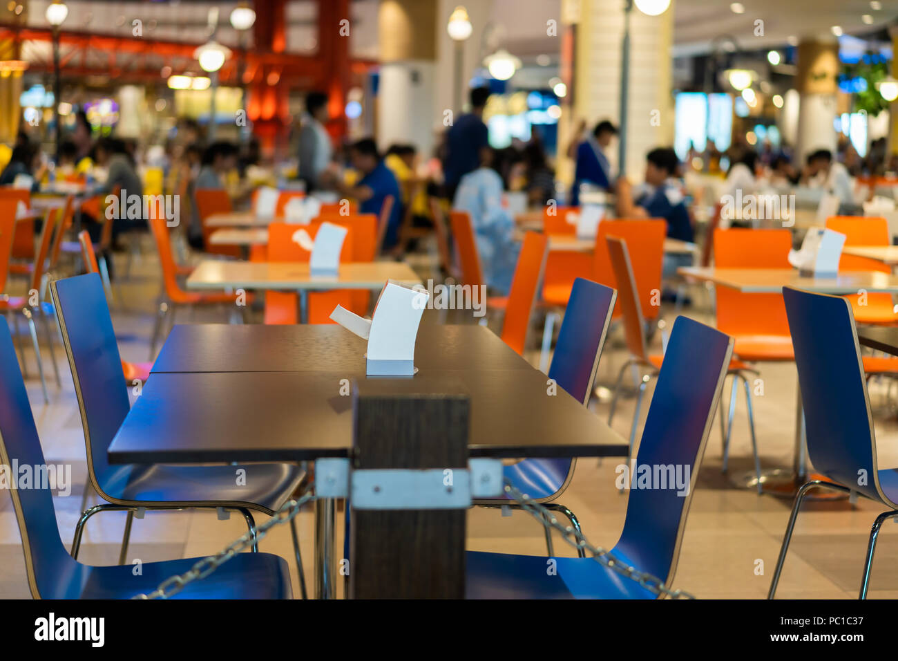 Tables and chairs on food court supermarket Stock Photo - Alamy