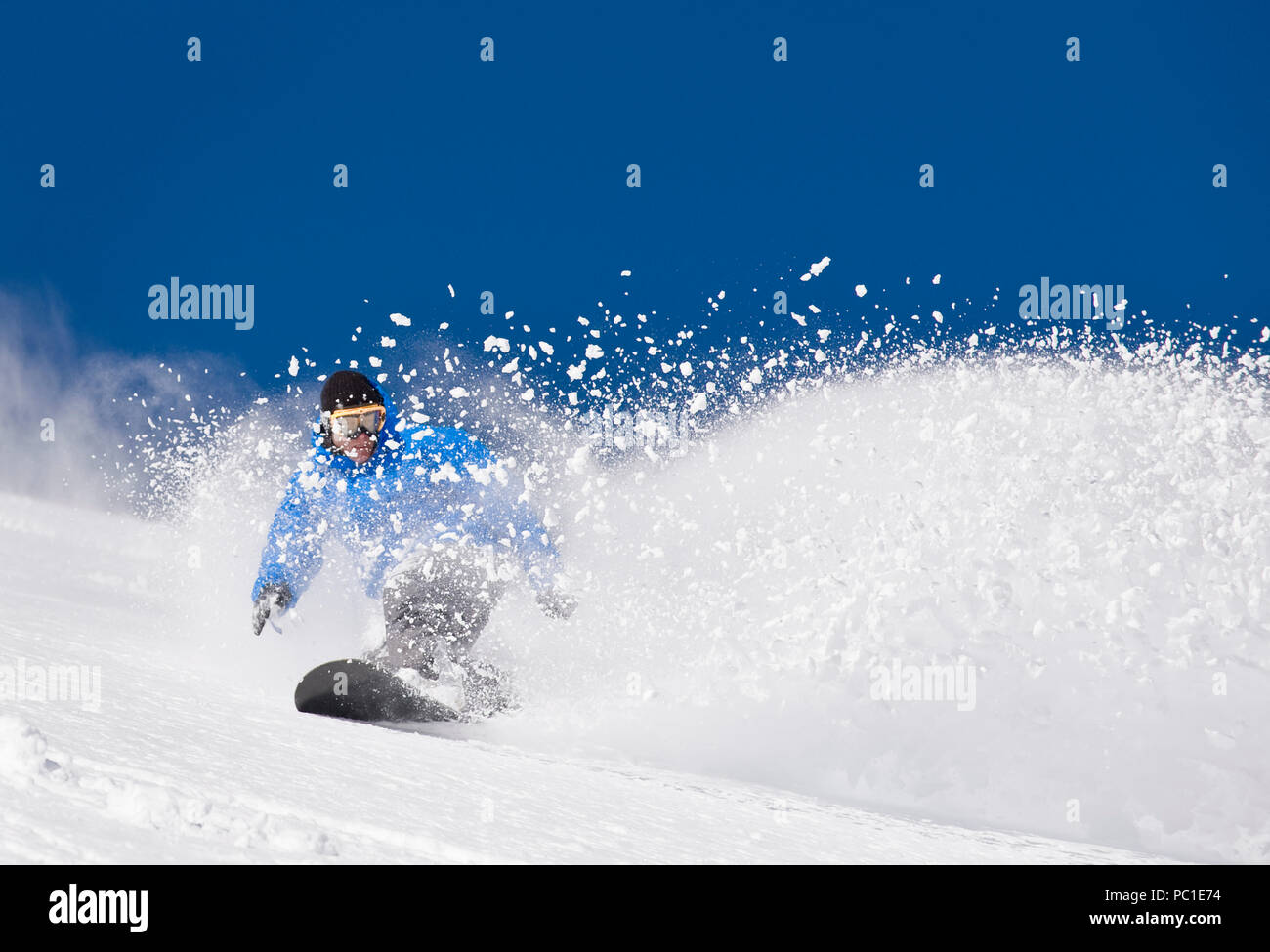 Peter Spain enjoys untracked snow and clear blue skies on the Davis