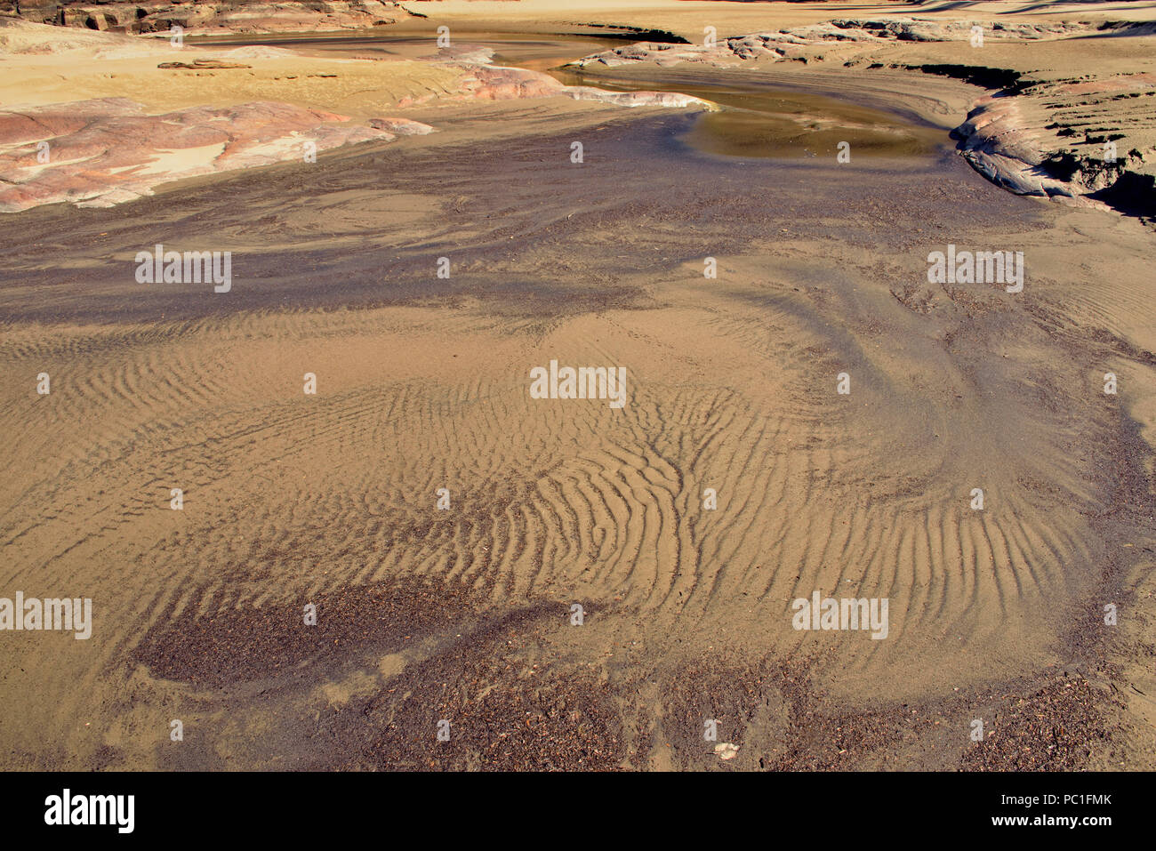 Slave River shoreline runoff patterns near the Mountain Rapids, near Fort Smith, Alberta, Canada Stock Photo