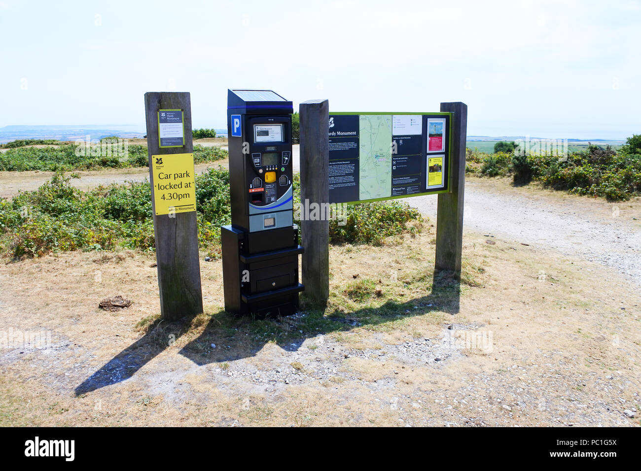 Car park pay and display machine, with information boards, at the Hardy Monument, Portesham, Dorset, UK - John Gollop Stock Photo