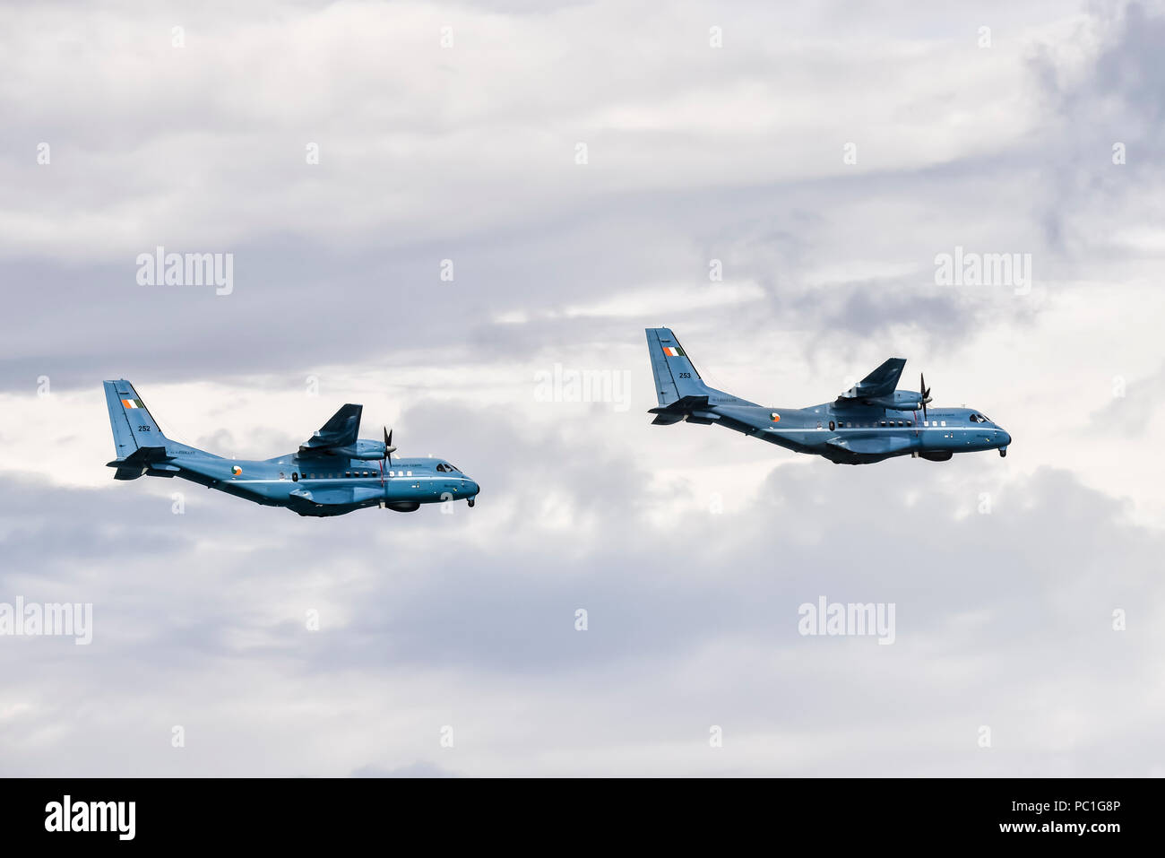 Two CASA CN-235 Maritime Patrol Aircraft belonging to the Irish Air Corps flying together in close formation. Stock Photo