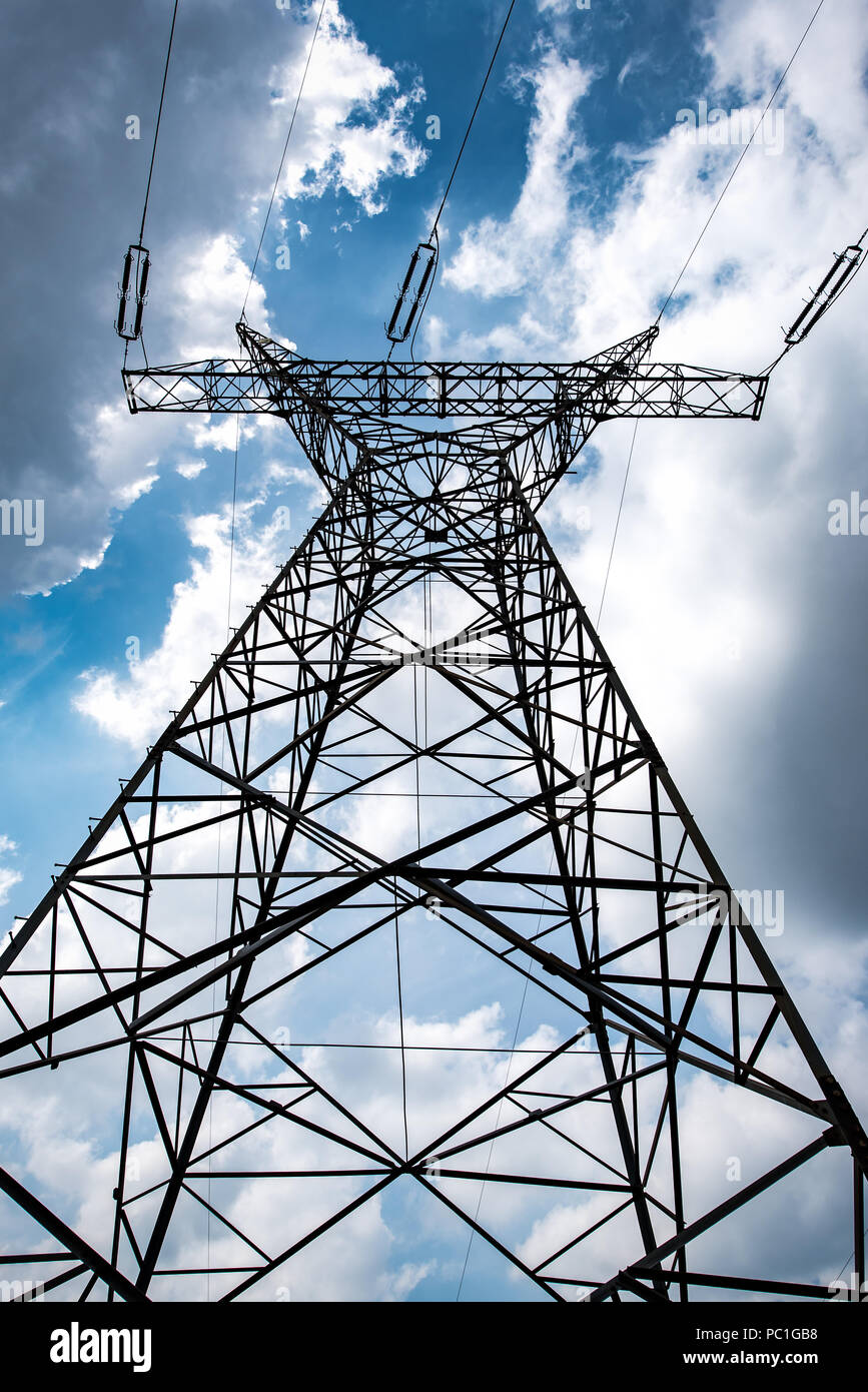electric pylon on the cloudy sky background Stock Photo - Alamy