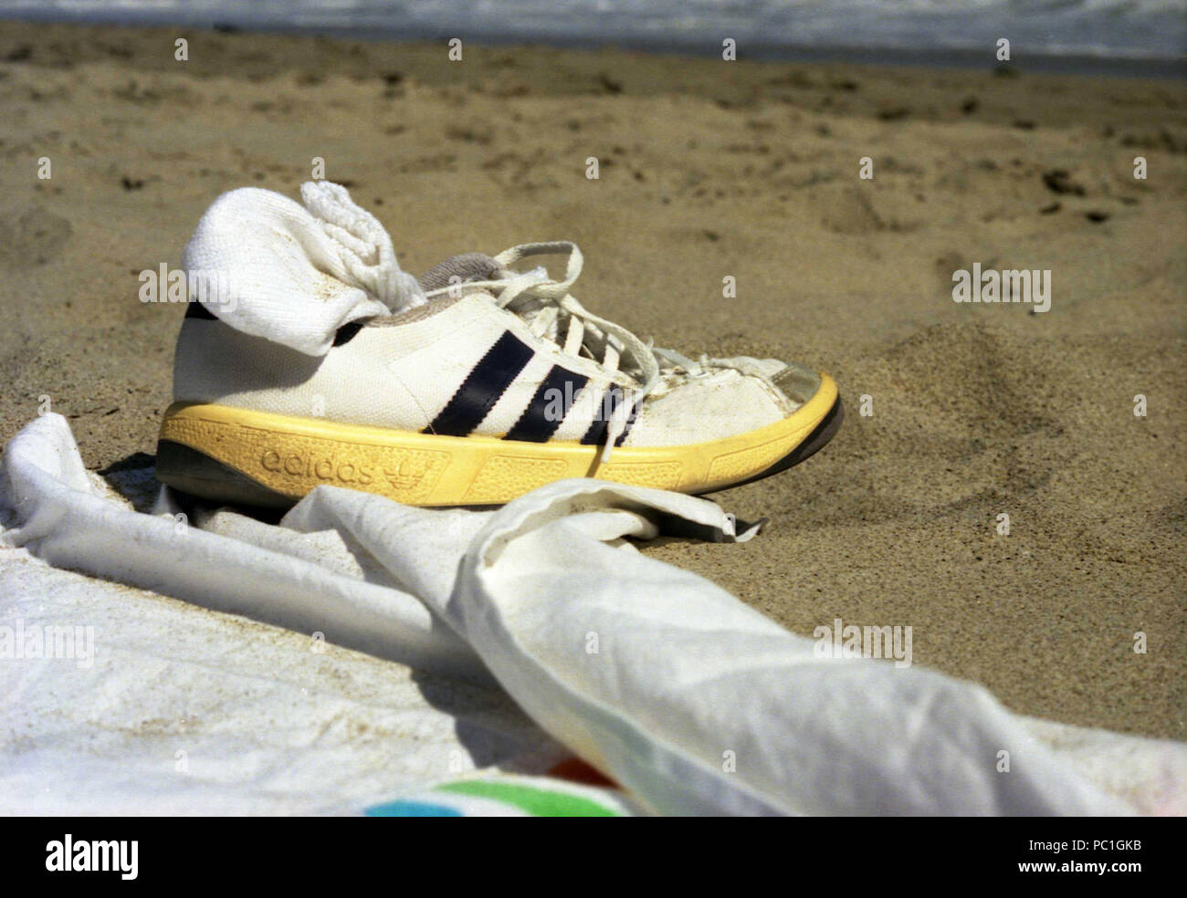 Adidas shoe on the beach, 1980s Stock Photo - Alamy