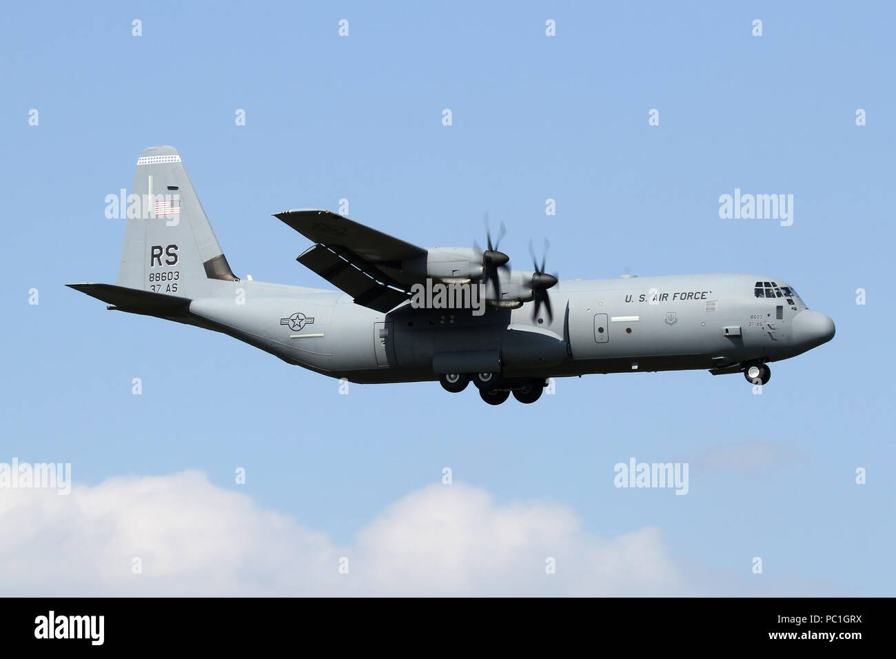 USAFE C-130J from the 37th Airlift Squadron on approach into RAF Mildenhall. The unit is part of the airlift wing assigned to Ramstein AB in Germany. Stock Photo
