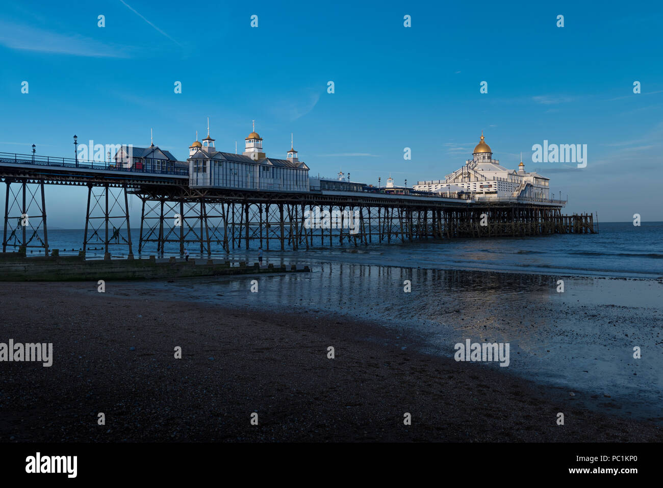 Eastbourne Pier at low tide, on the south coast of the county of East Sussex in southern England, UK. Stock Photo