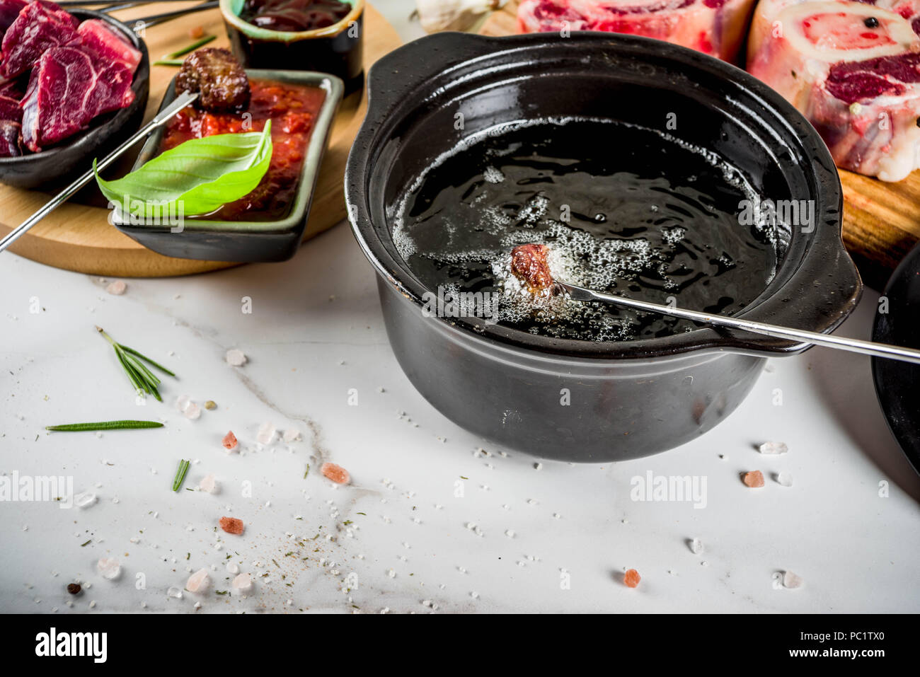 Beef meat fondue, with different sauces, top view copy space Stock Photo Alamy