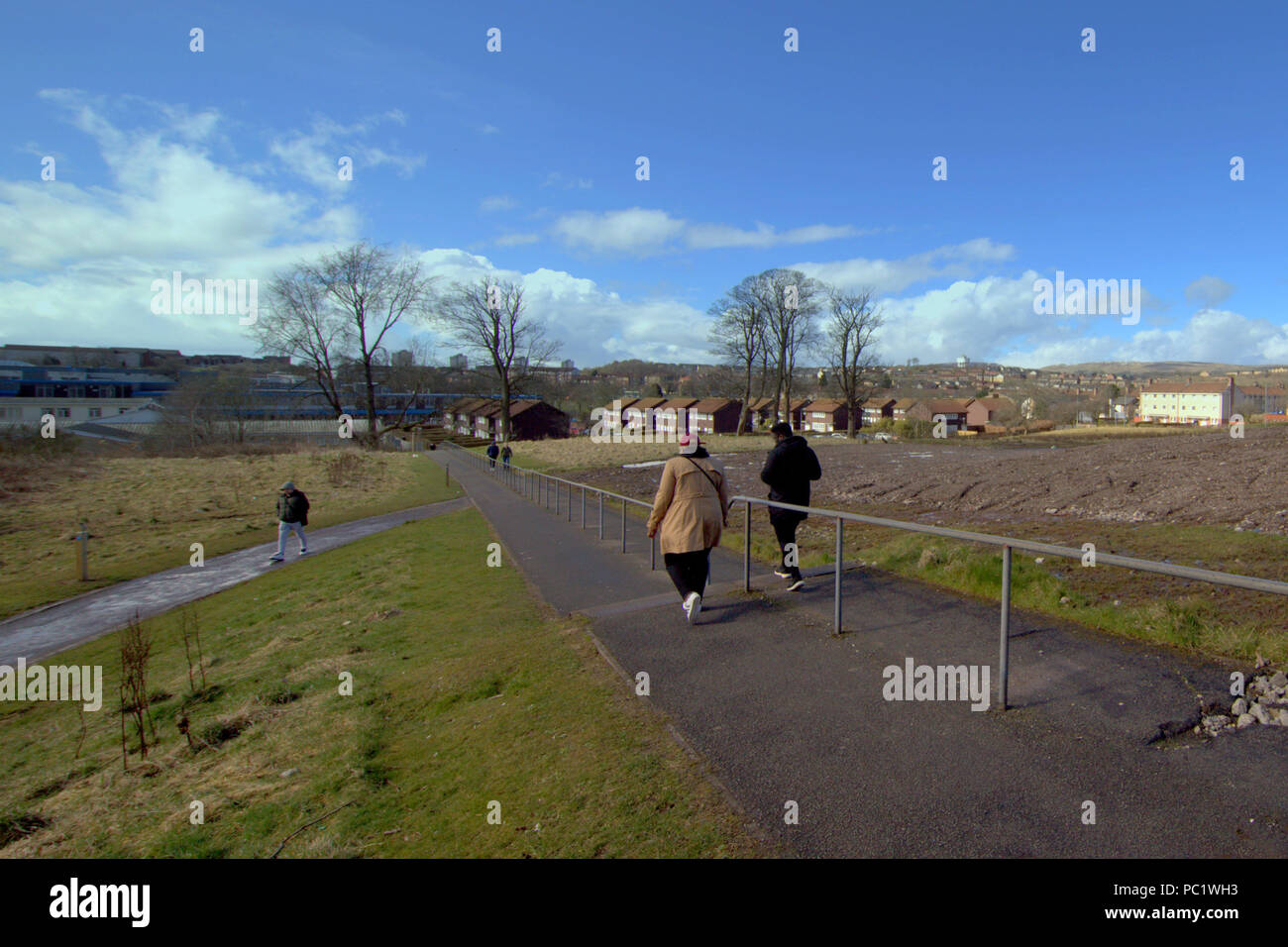 blue sky open paths at linkwood panoramic open view of the centre of deprived housing  scheme of drumchapel in Glasgow Stock Photo