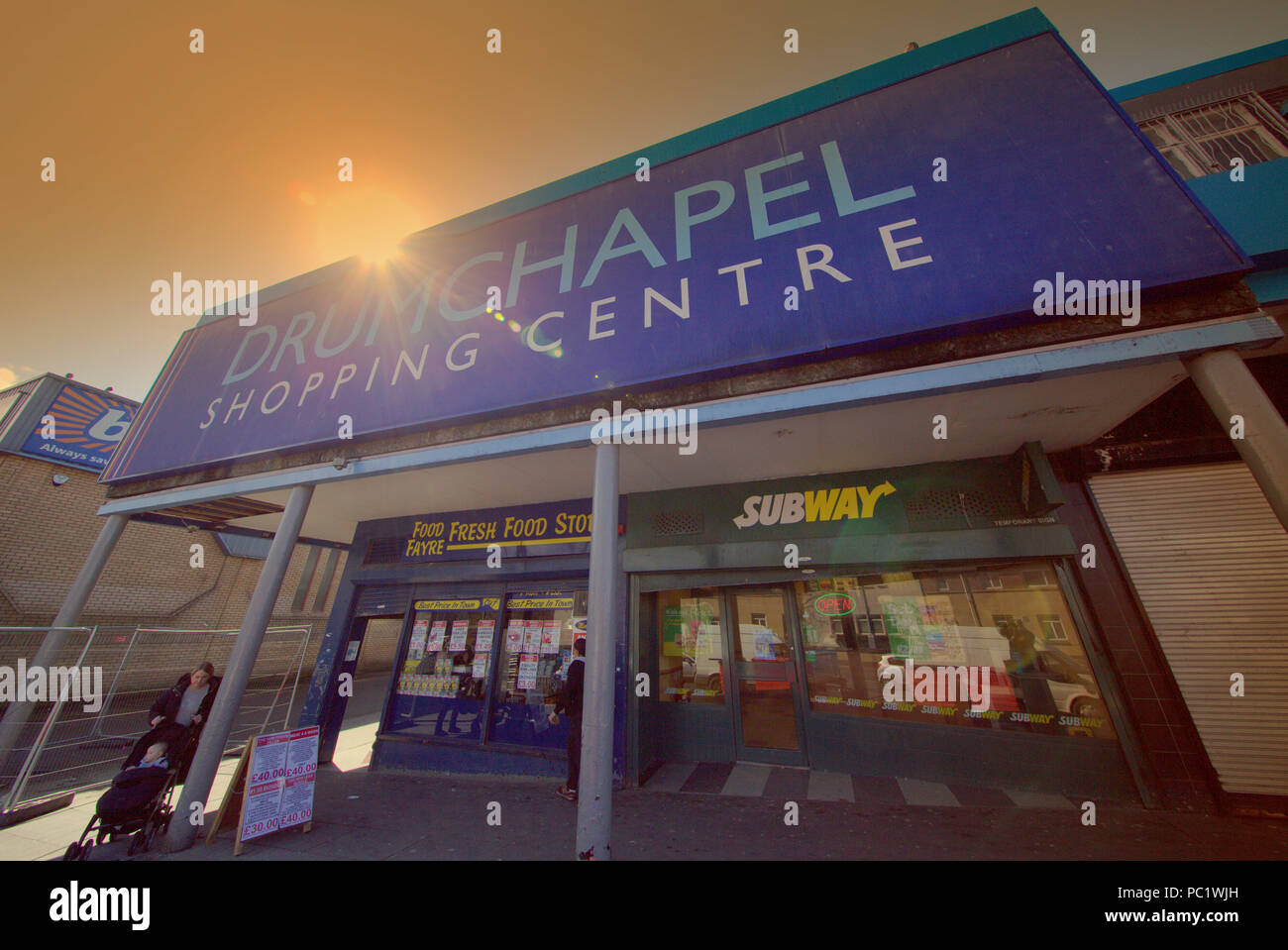 sign board of drumchapel shopping centre or mall in deprived housing  scheme in Glasgow Stock Photo