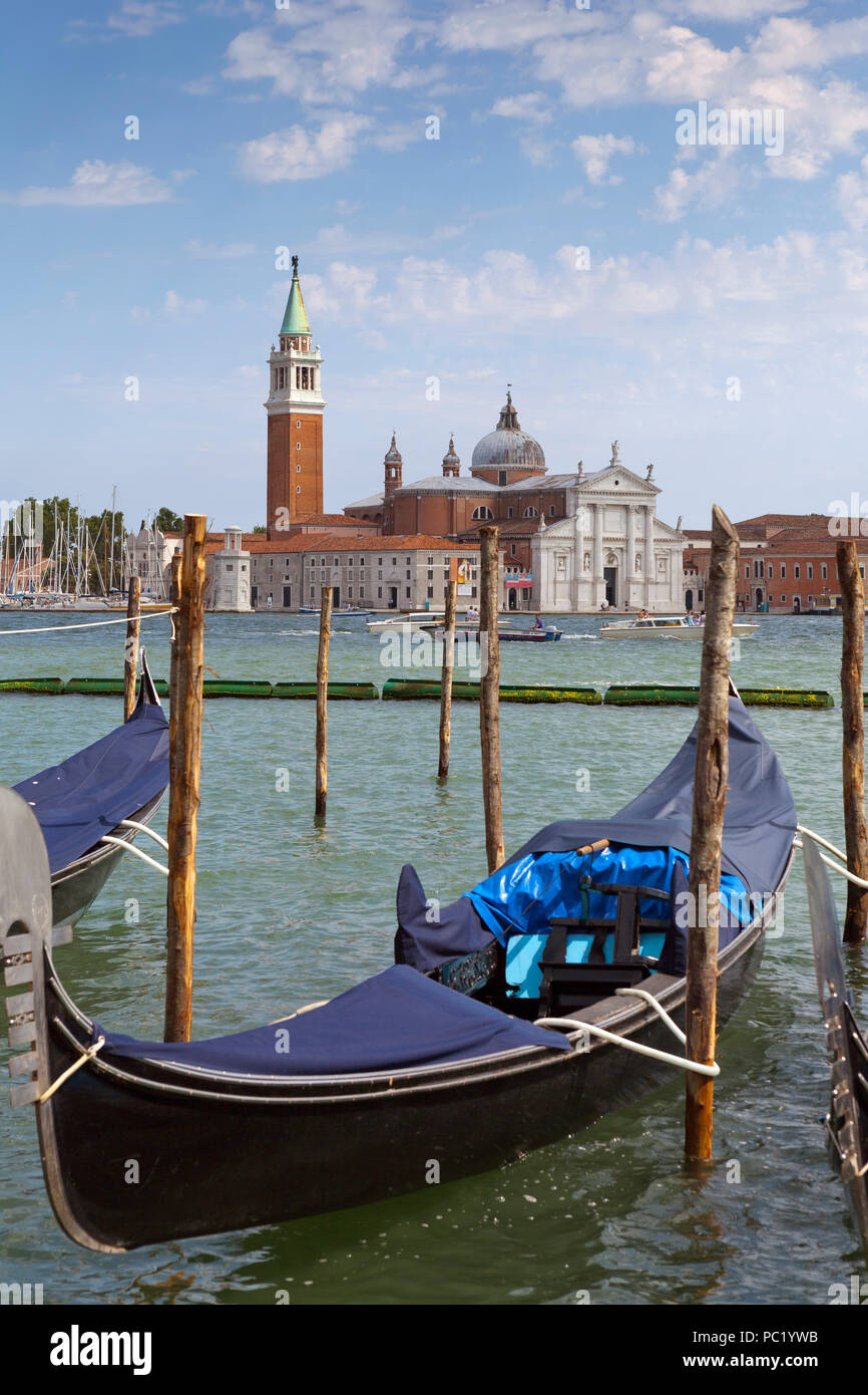 Moored gondola, with view of Church of San Giorgio Maggiore, Venice Stock Photo