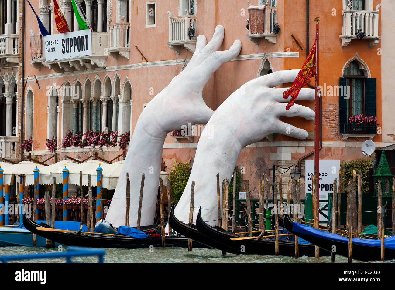 Giant hands sculpture in Venice Stock Photo - Alamy