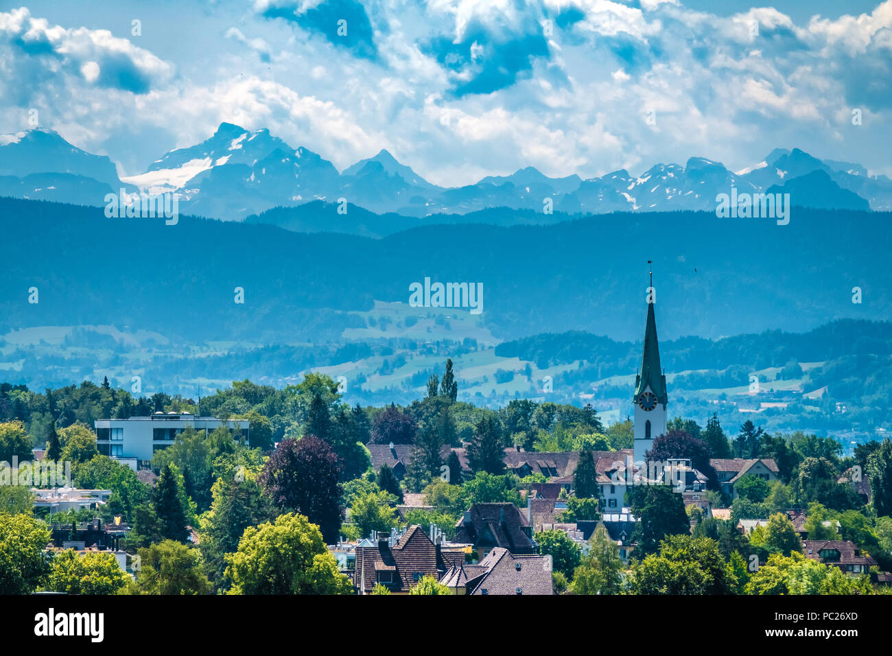Distant view of the city of Zoolikon from the wine terraces of Weinegg district of the city of , Zurich, Switzerland Stock Photo