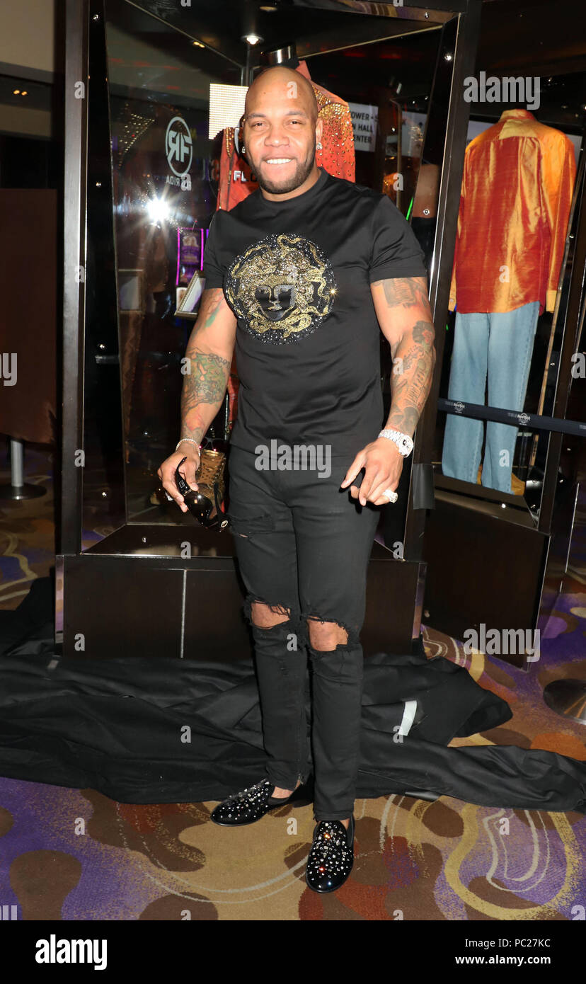 Performer Flo Rida unveils personalized memorabilia case at Hard Rock ...