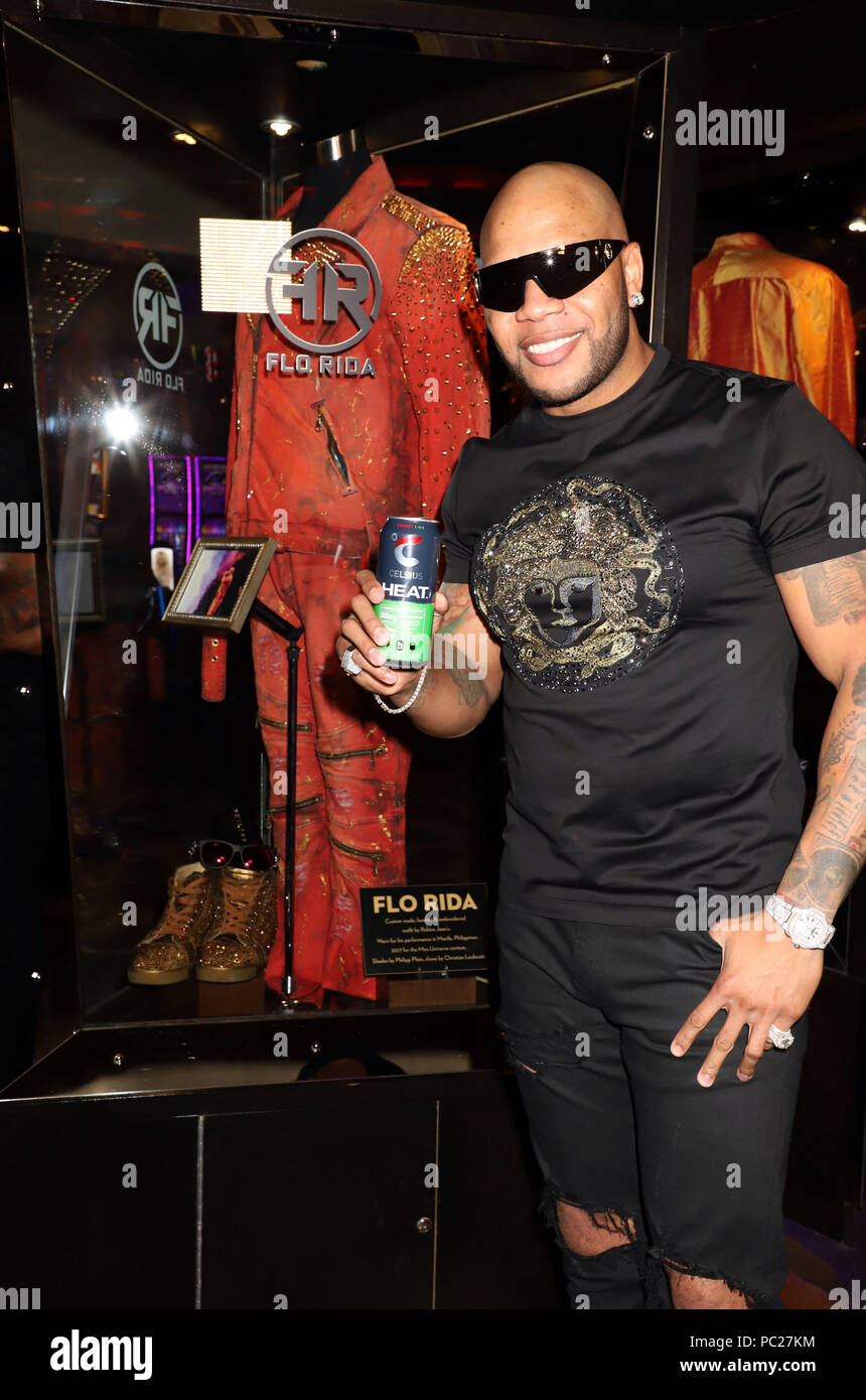 Performer Flo Rida unveils personalized memorabilia case at Hard Rock ...