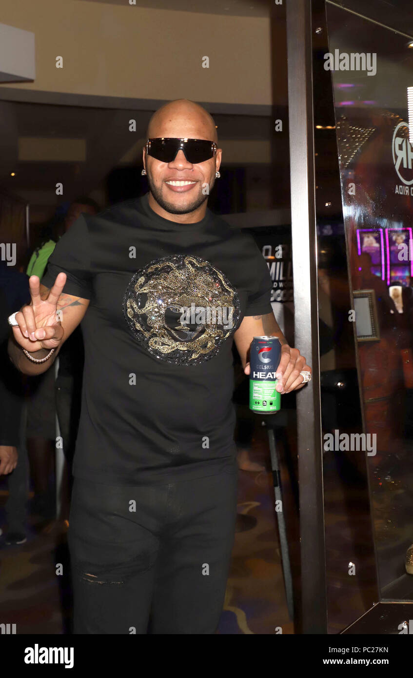 Performer Flo Rida unveils personalized memorabilia case at Hard Rock ...