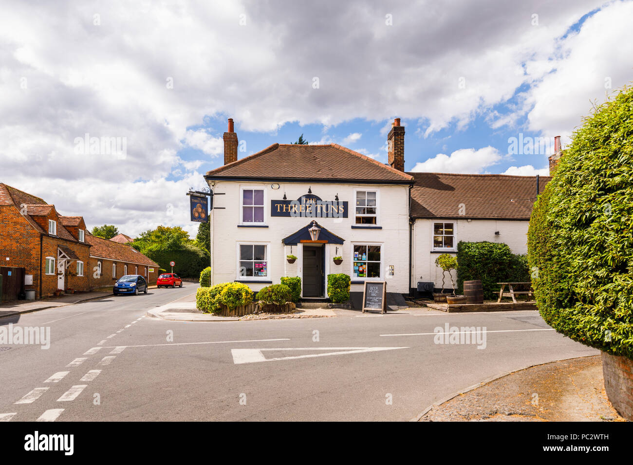The Three Tuns, a traditional free house country pub in Great Bedwyn, a rural village in Wiltshire, southern England in summer on a sunny day Stock Photo