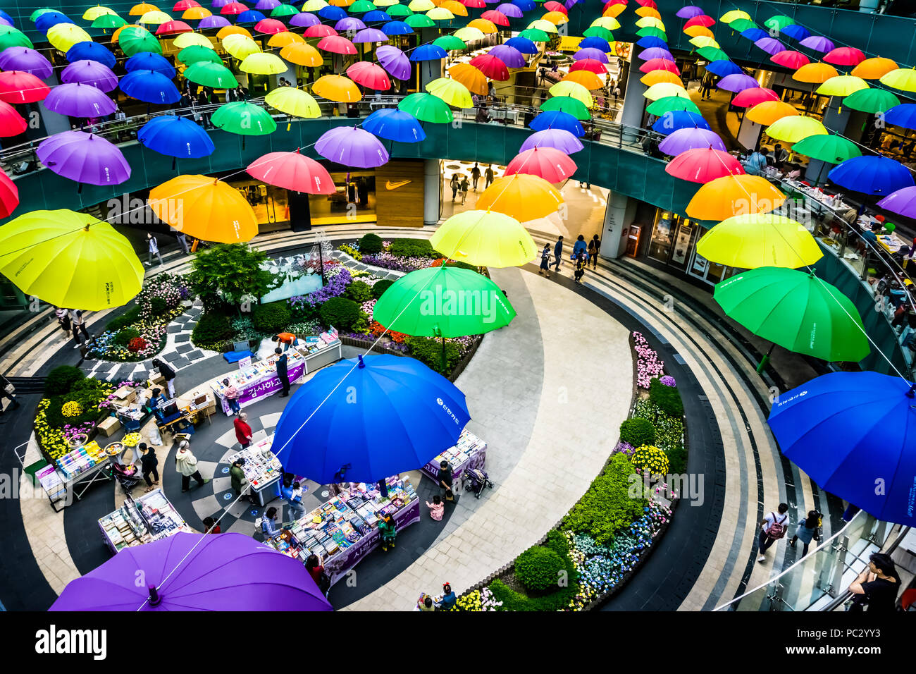 Seoul, South Korea - May 14, 2017: Mecenatpolis mall in Hapjeong have wave  lines not just square inside the building. Colorful umbrellas decoration ma  Stock Photo - Alamy