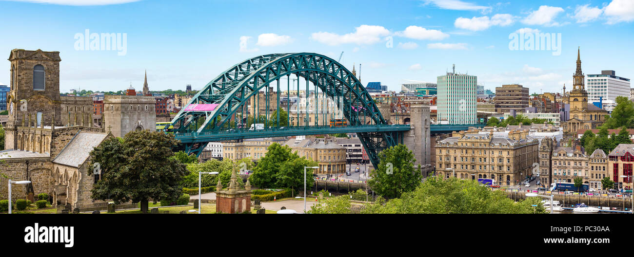 A view of the Gateshead Millennium Bridge on the River Tyne from Newcastle looking towards the Tyne Bridge. Stock Photo