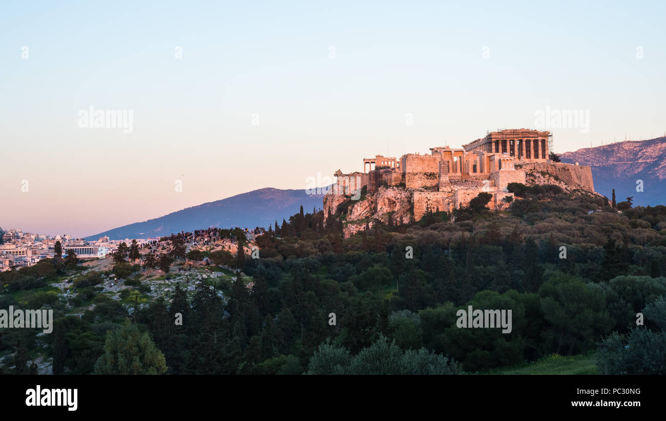 The Parthenon Temple at the Acropolis of Athens during colorful sunset ...
