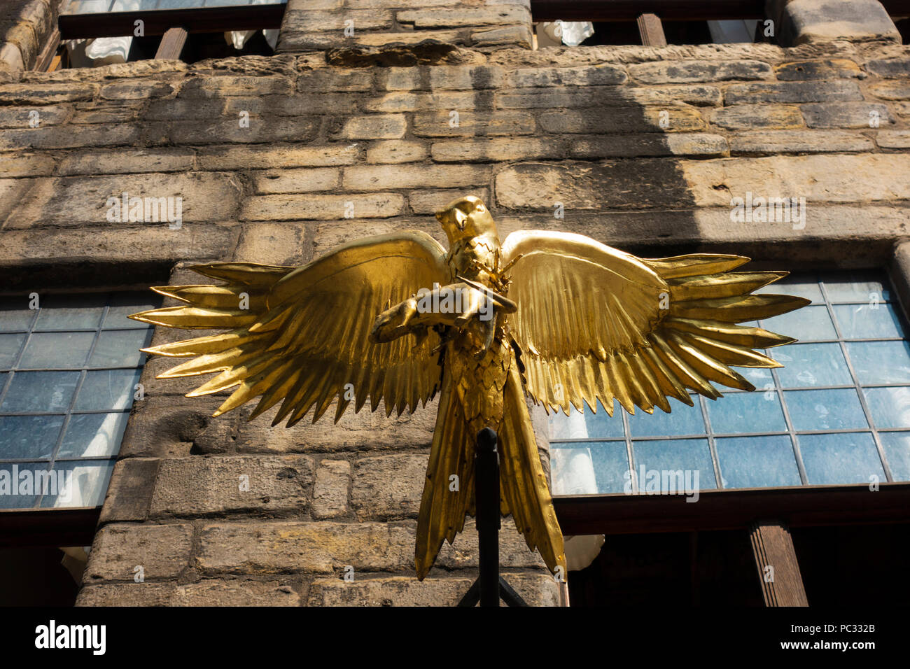Golden bird outside Gladstones Land historic building on Royal Mile in Old Town of Edinburgh, Scotland, Uk Stock Photo