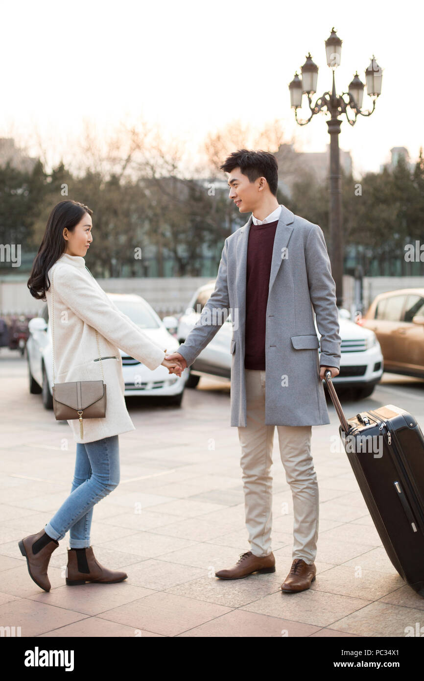 Standing looking away smiling leaving hi-res stock photography and ...