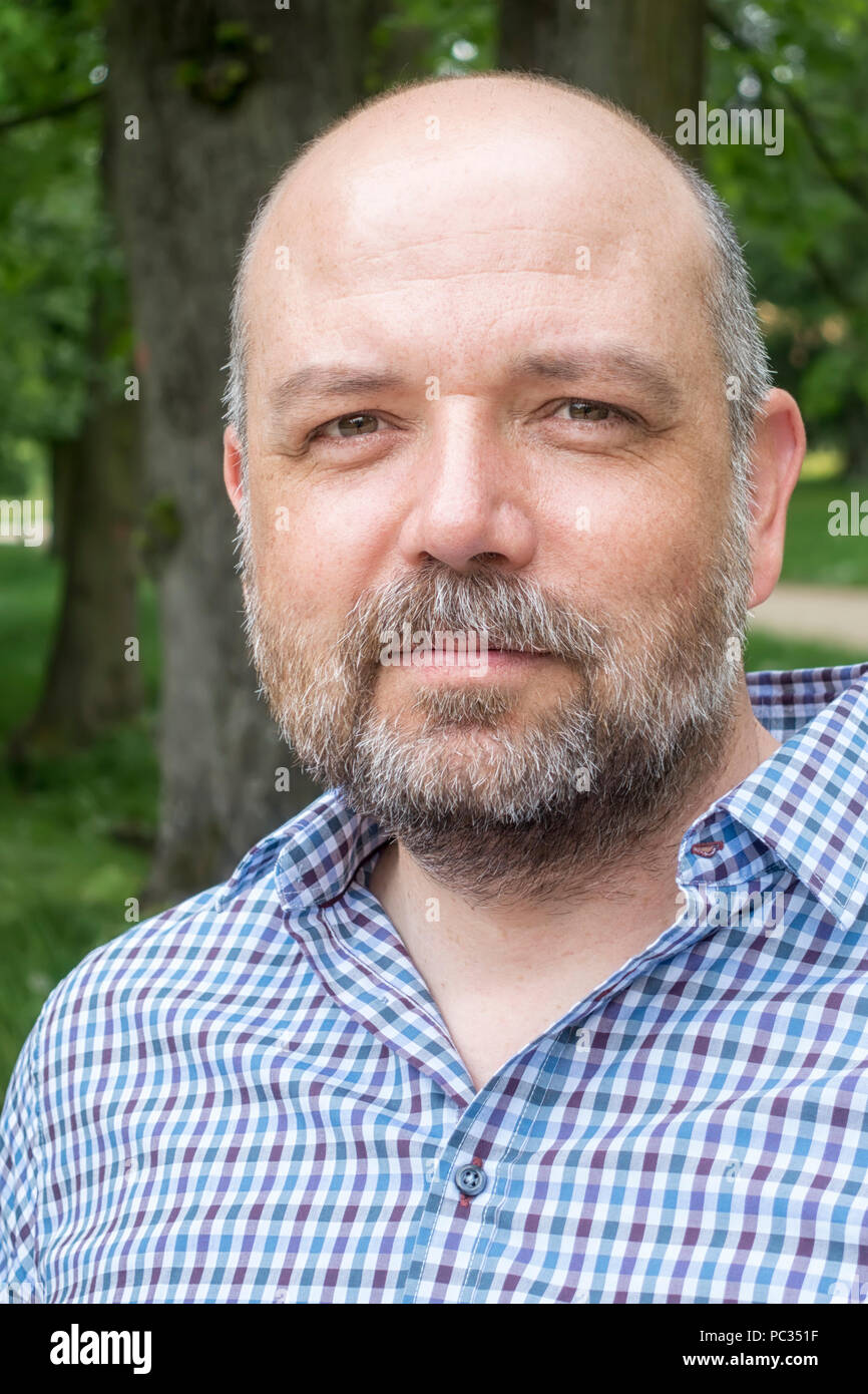 An image of a handsome bearded man portrait outdoors Stock Photo