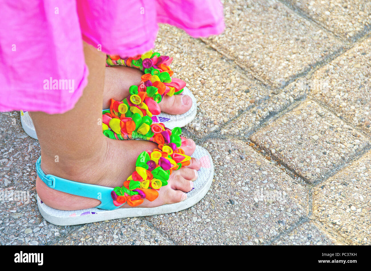 little girls in flip flops