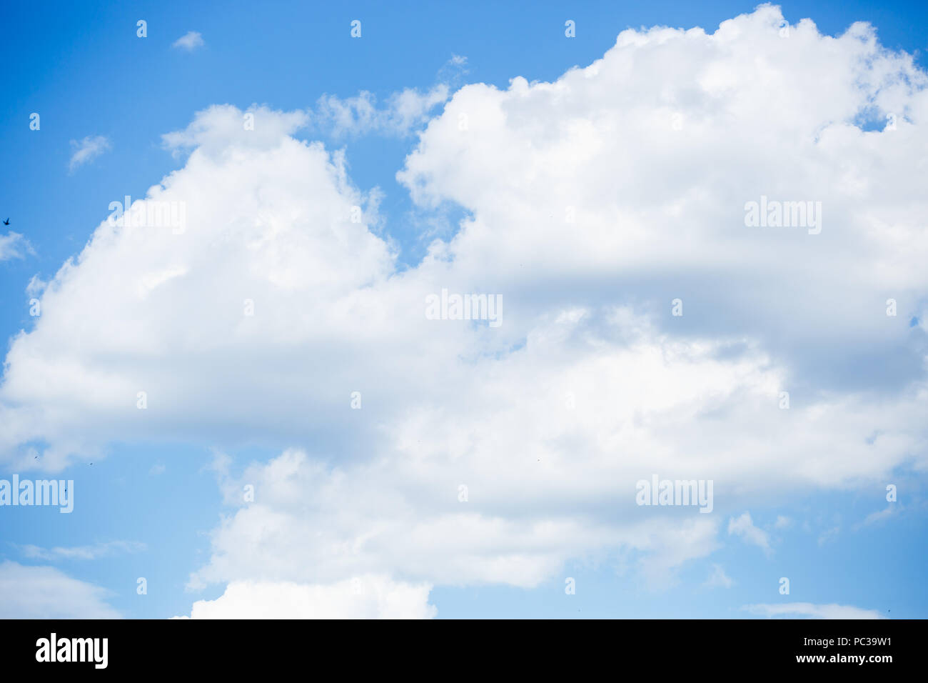 Aerial photo of bright blue sky with white fluffy clouds in sunny ...