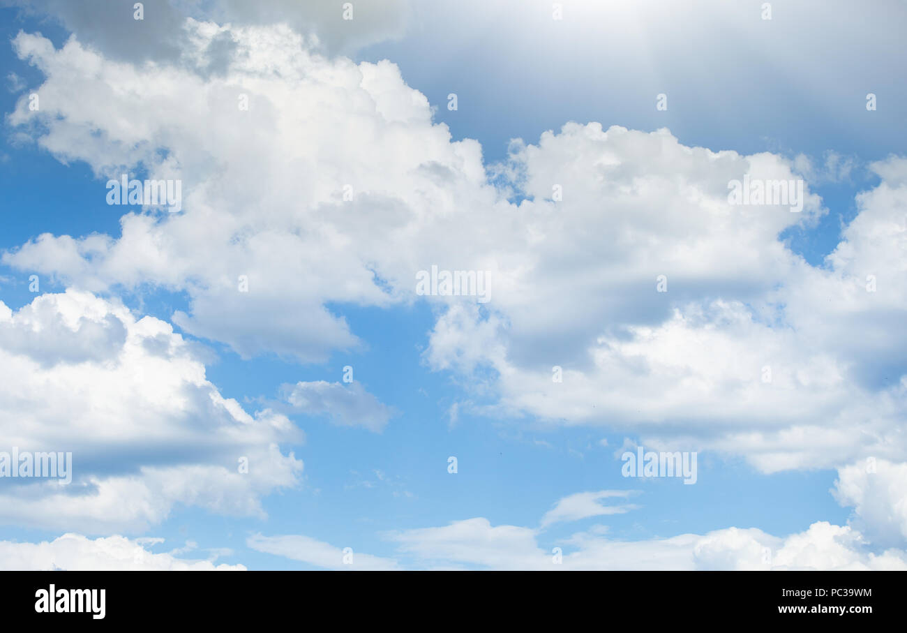 Aerial photo of bright blue sky with white fluffy clouds in sunny ...