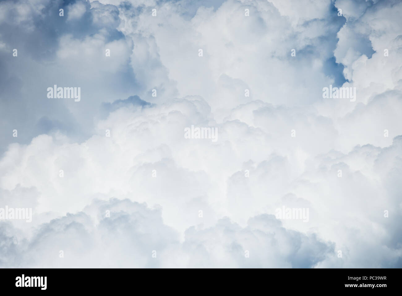 Aerial photo of bright blue sky with white fluffy clouds in sunny ...