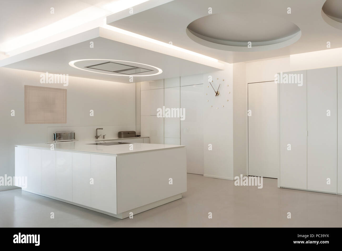 Luxury apartment, white kitchen in modern style Stock Photo