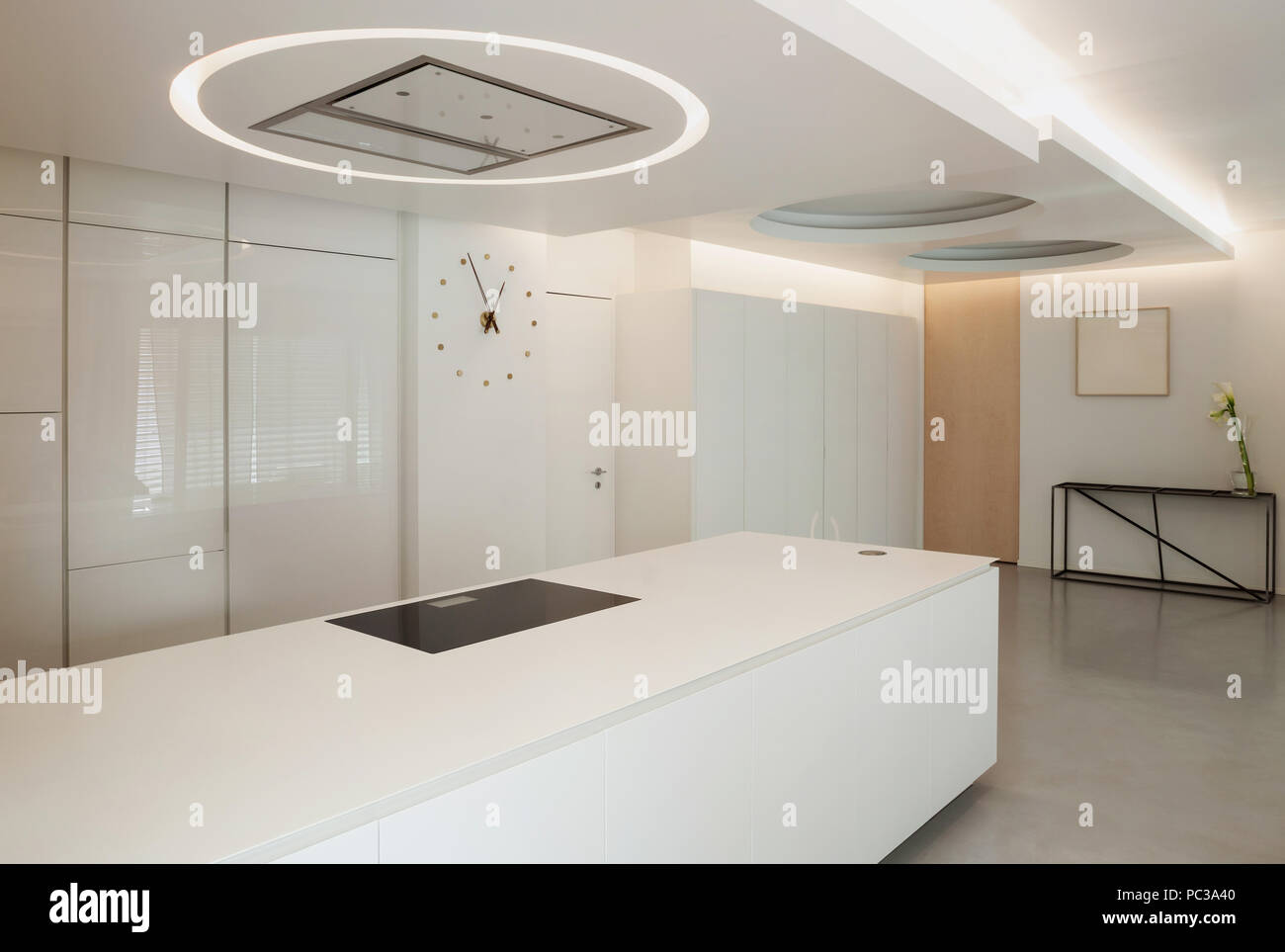 Luxury apartment, white kitchen in modern style Stock Photo