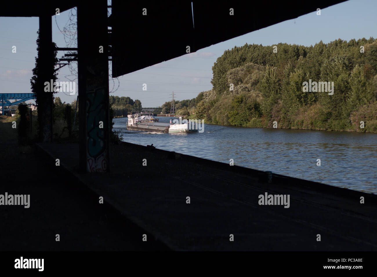 Boat on an Industrial Landscape Stock Photo