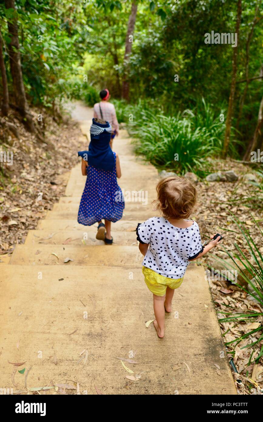 Children walking down the track from Panjoo lookout to see Hinchinbrook