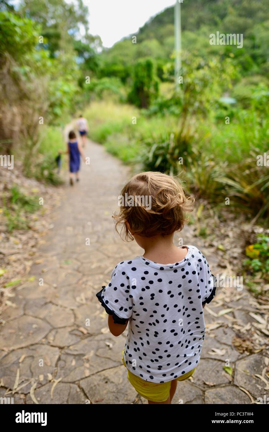 Children walking down the track from Panjoo lookout to see Hinchinbrook