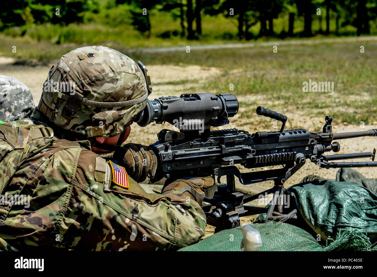 U.S. Army Reserve Troop List Unit Soldiers participate in ground qualification with an M249 light machine gun during Operation Cold Steel II, hosted by U.S. Army Civil Affairs and Psychological Operations Command (Airborne), July 18, 2018 at Joint Base McGuire-Dix-Lakehurst, N.J. Operation Cold Steel is the U.S. Army Reserve's crew-served weapons qualification and validation exercise to ensure America's Army Reserve units and Soldiers are trained and ready to deploy on short notice as part of Ready Force X and bring combat-ready and lethal firepower in support of the Army and our joint partner Stock Photo