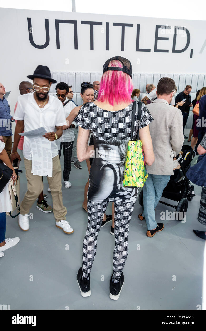 Miami Beach Florida,Art Basel Week,Untitled,gallery show contemporary,attendee,pink hair,artsy fashion style,statement clothing,inside interior,tent,F Stock Photo