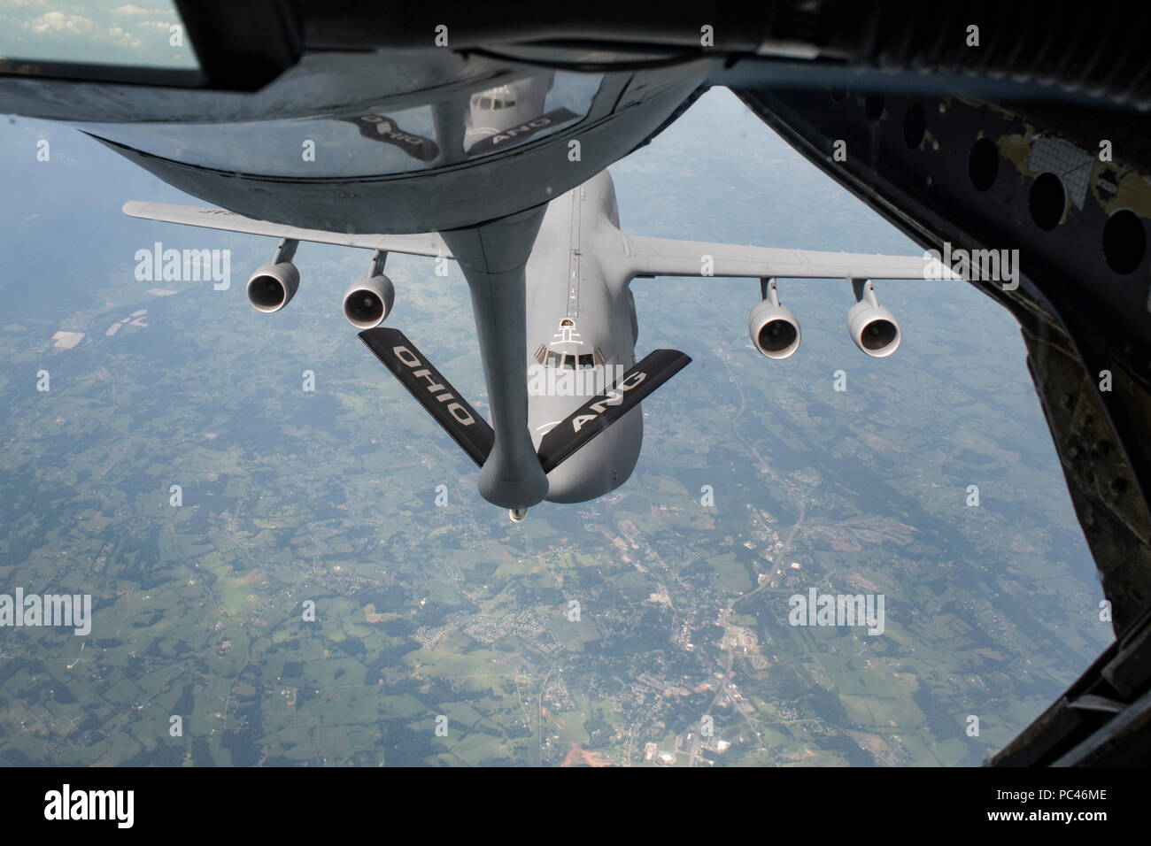 A C-5 Galaxy with Dover Air Force Base, Delaware flies to the boom of a